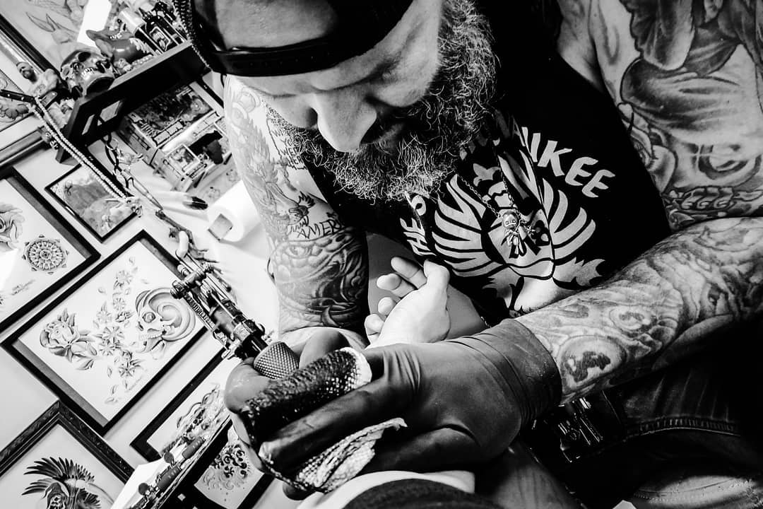 Art collectors get colorful body modifications with tattoos at annual  convention  Milwaukee Independent